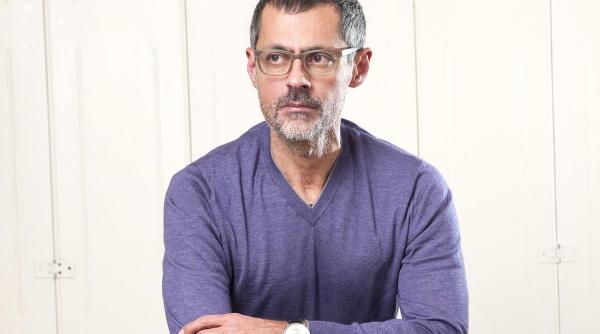 Un bancher, condamnat în România pentru spionaj, dă în judecată Credit Suisse