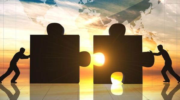 Preluare. Se crează o companie financiară cu active de 1.500 mld. dolari