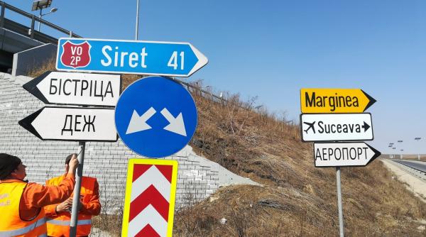 Indicatoare rutiere în limba ucraineană, montate în România - Foto