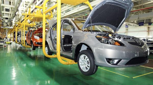 Marea Britanie vrea să întrerupă un acord de liber schimb cu Canada. Industria auto, vizată direct