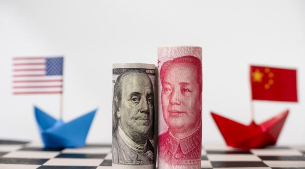 Ofensiva financiară a Chinei: Yuanul, noul rival al dolarului?